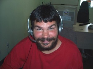 Employ-Ability Participant Tyler wearing a headset