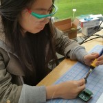 kelly-working-on-a-lipsync-soldering