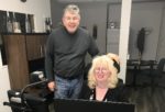 Mirjana at her desk with Roch Fortin and her assistive setup