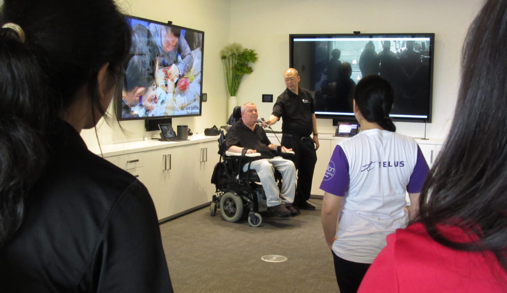 Don Danbrook speaking at a TELUS event