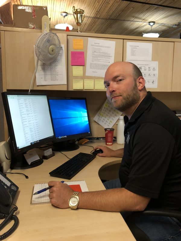 Chad at his desk