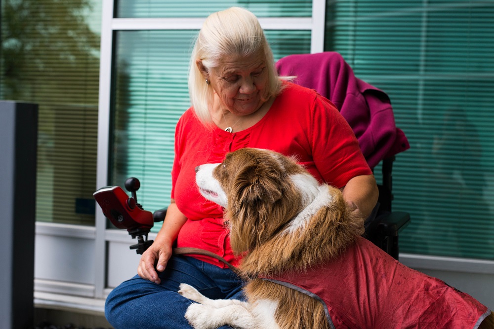 Laurie with Britt, her dog