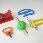 key turner, nail clipper holder, bag carrier, pen holder, pen ball