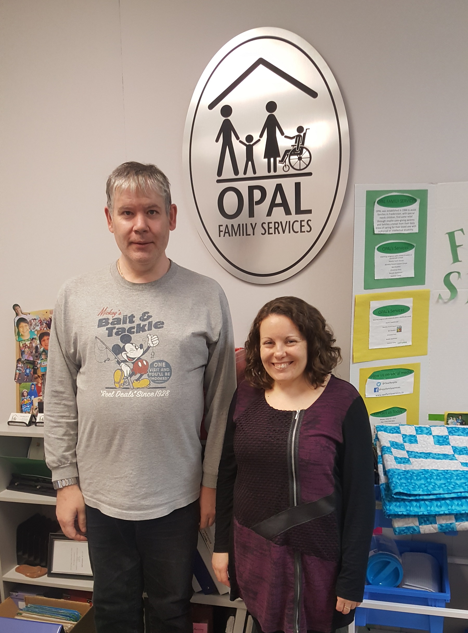 Joel (left) with Erica Young, Executive Director of Opal Family Services