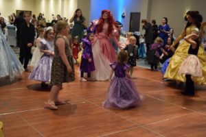 Children dancing with Princesses