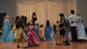 Children dancing with their parents, Princesses, and each other