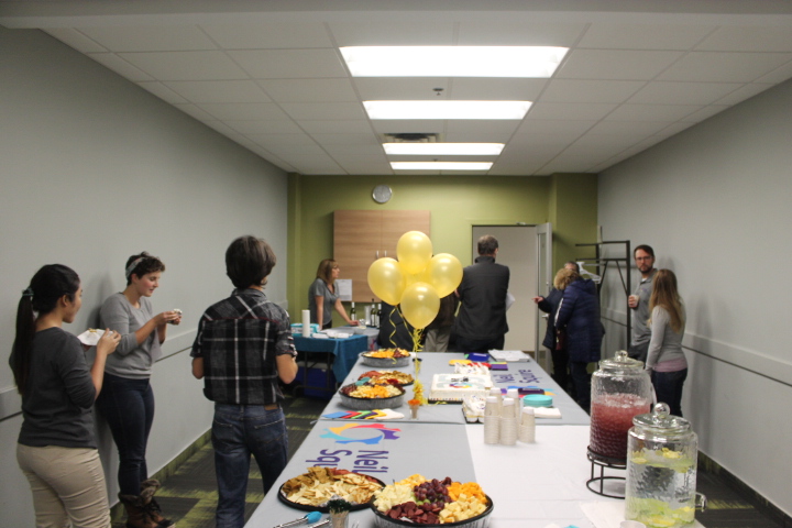 Attendees having food and cake