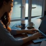 Woman working at a laptop