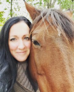 Lucy and one of her horses