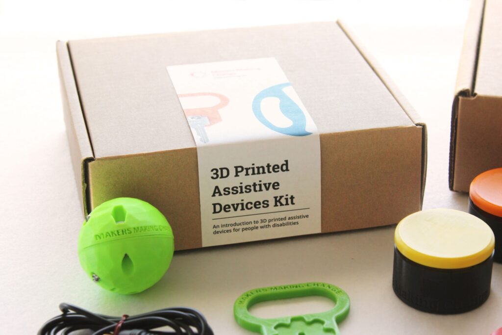 A 3D printed assistive device kit, including a pen ball, key turner, and round flexure switch