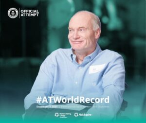 Picture: Neil Squire Executive Director Gary Birch in a wheelchair. Text: GUINNESS WORLD RECORDS official attempt, #ATWorldRecord on December 3rd, 2021, UN Day for People with Disabilities.