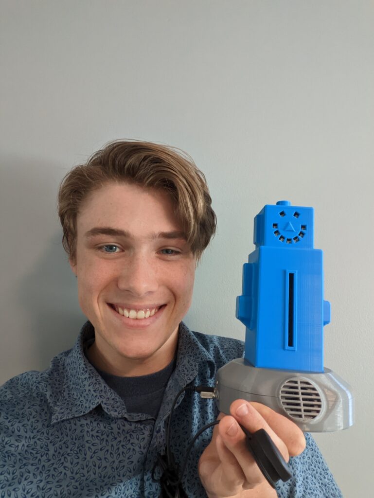 MMC intern Taz with the OpenAT 3D printed toy