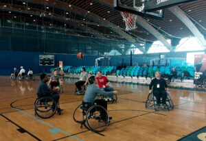 Neil Squire staff plays a game of wheelchair basketball together