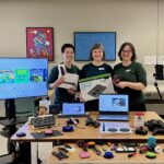 The GF Strong team showing off their assistive technology for gaming.