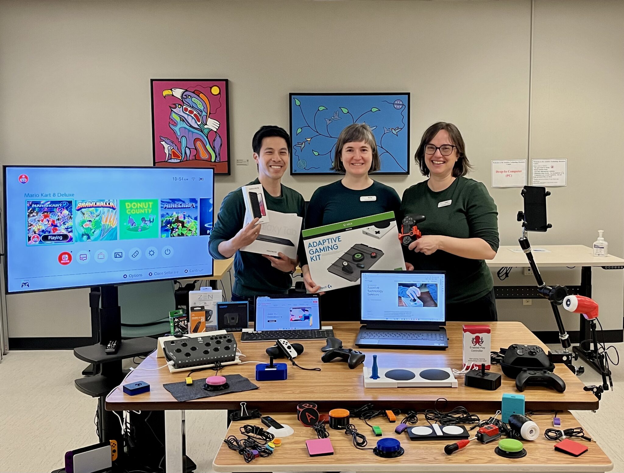 The GF Strong team showing off their assistive technology for gaming.