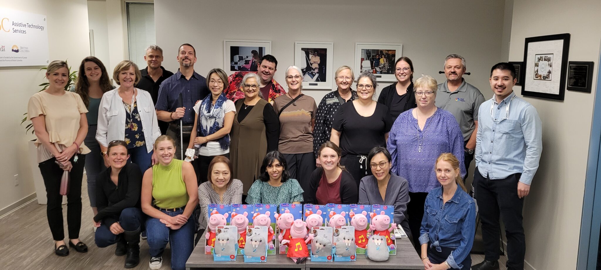 The Solutions team with their adapted toys.