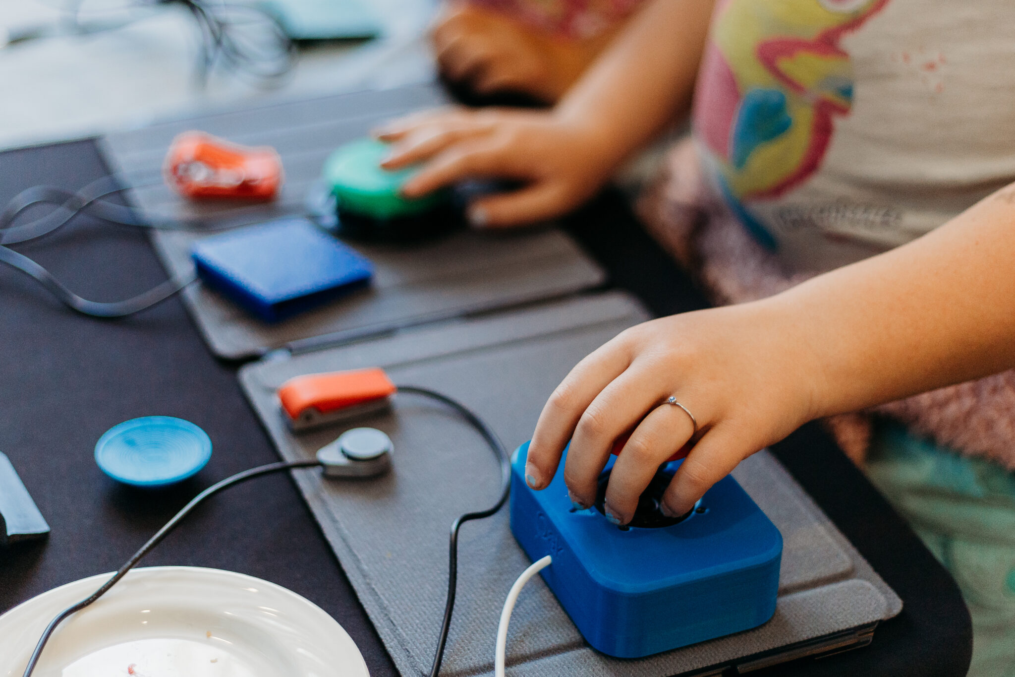 A person using a variety of switches.