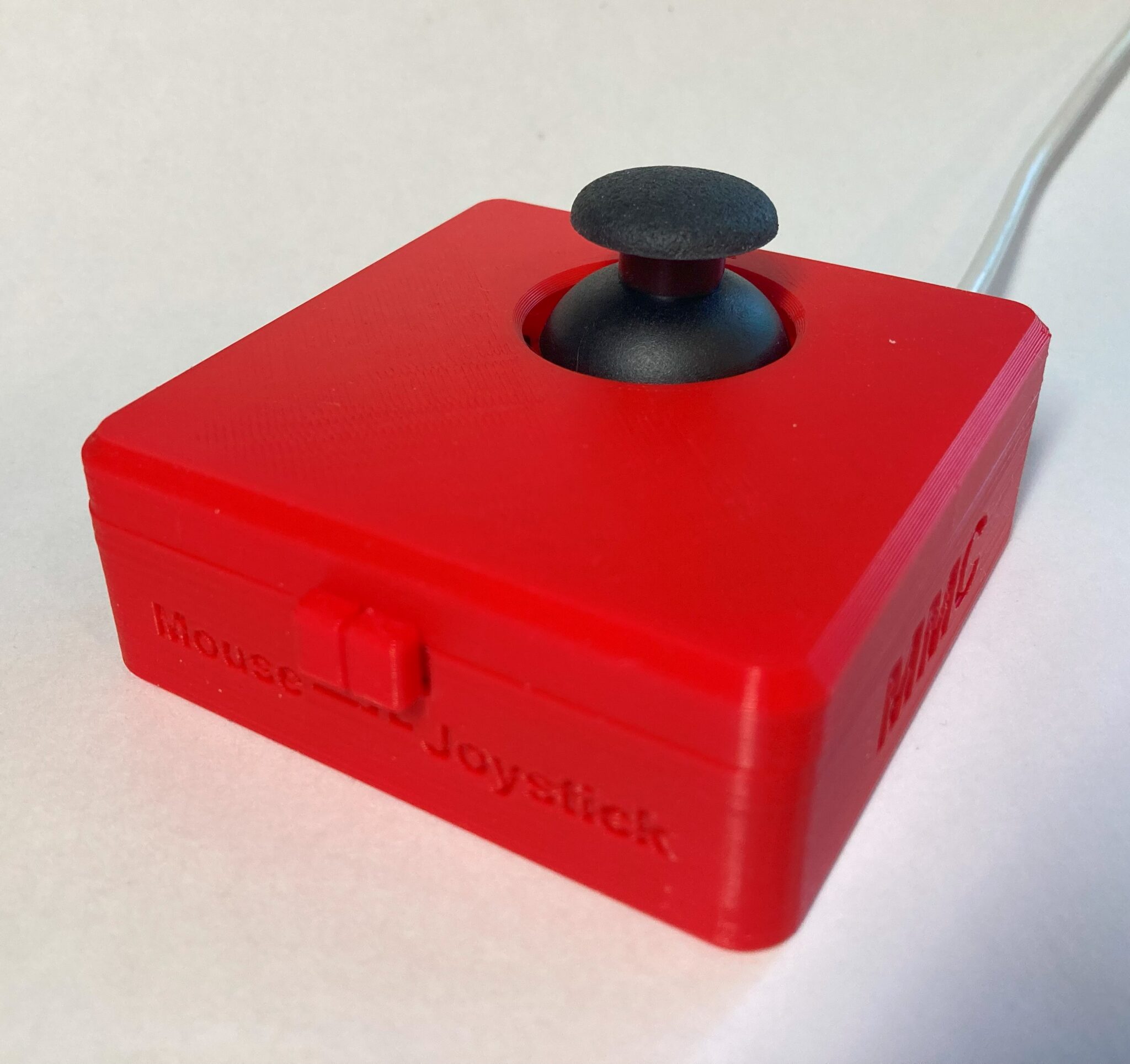 A Cedar Mini Joystick, which also uses a thumbstick.