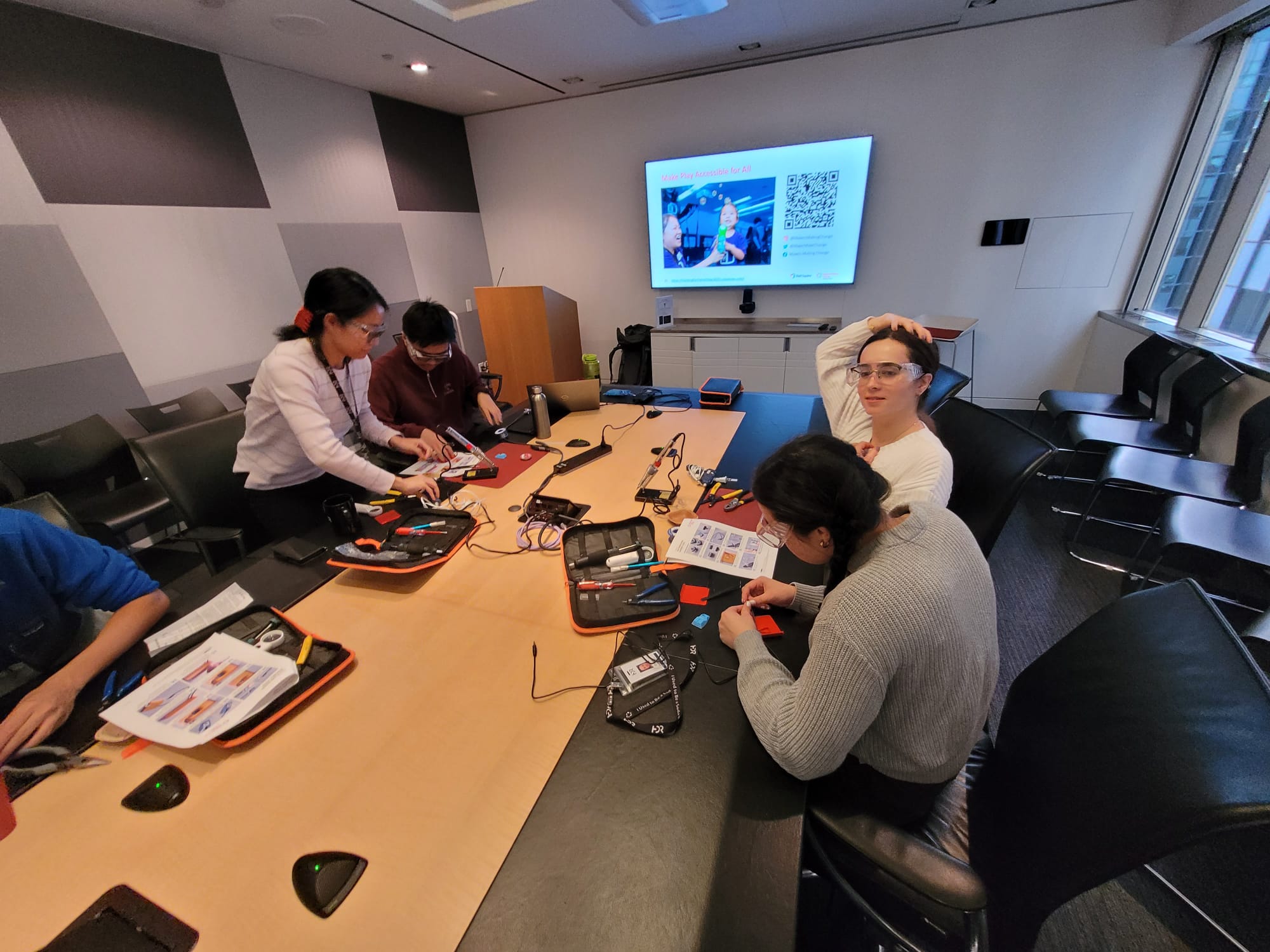 SaskPower staff work together to make toys.