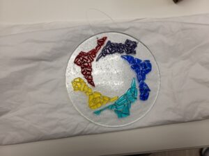 Fused Glass Suncatcher of our logo.